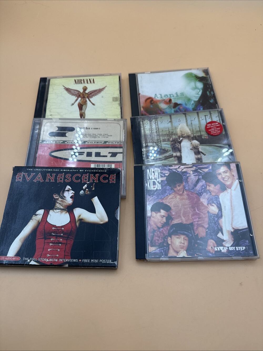 lot of 6-90s cds Rock/Nirvana/Alanis/Filter/Soul Asylum/Evanescence/new Kids